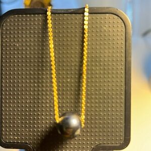 Tahitian black Edison fresh water pearl with adjustable hypoallergenic chain.